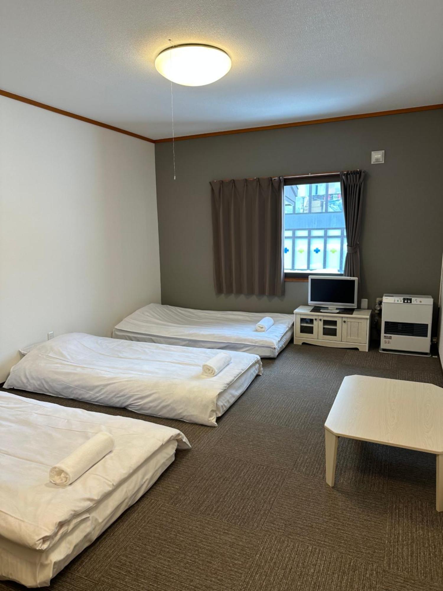 Pension Berg Niseko Esterno foto