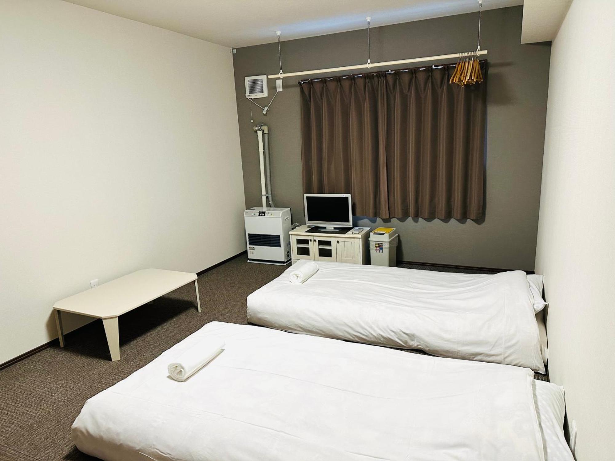 Pension Berg Niseko Esterno foto