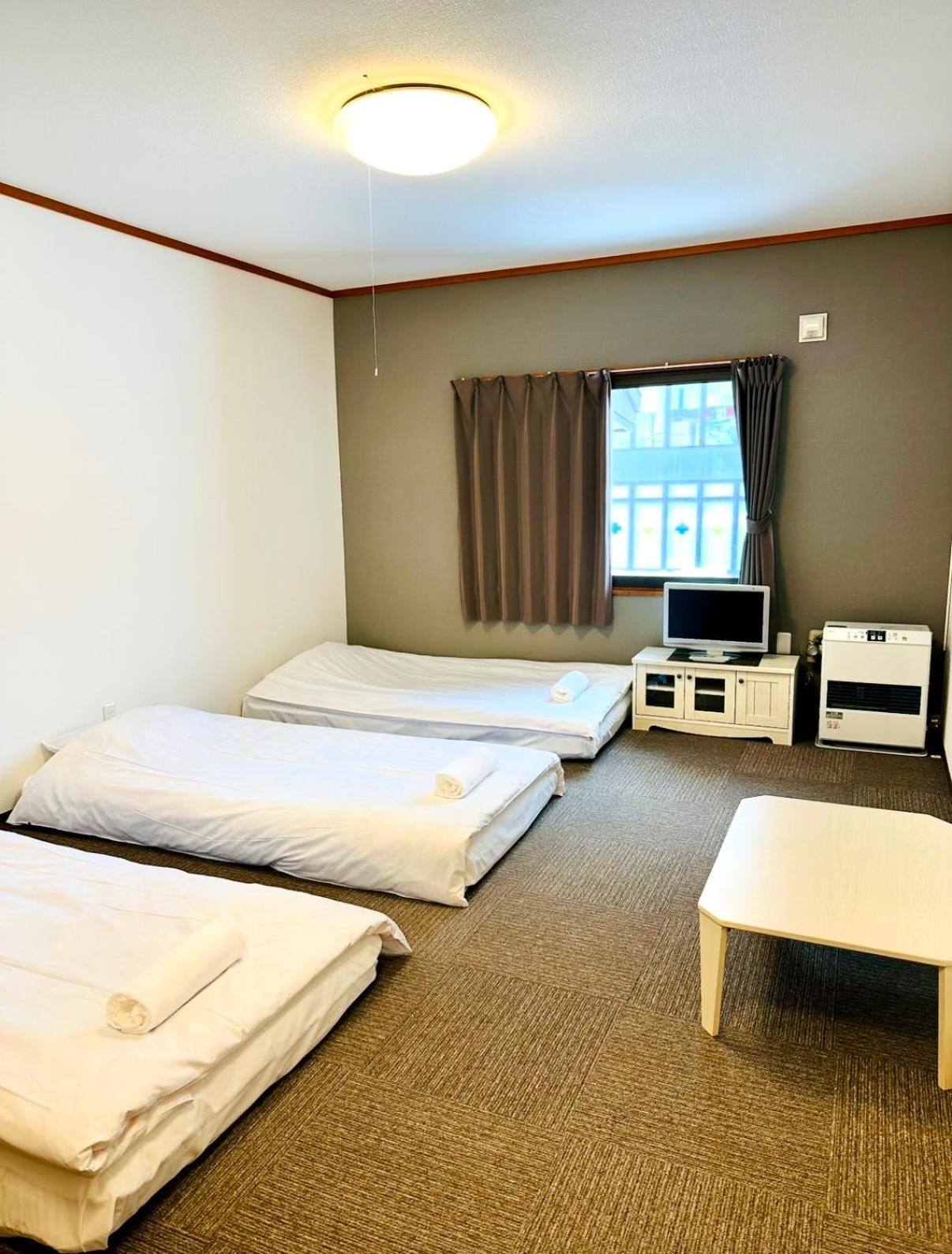 Pension Berg Niseko Esterno foto