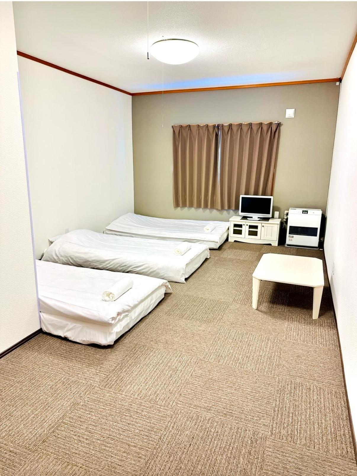 Pension Berg Niseko Esterno foto